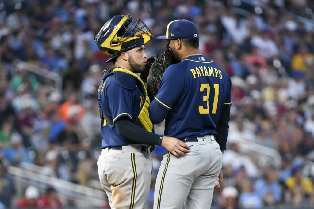 Canha's grand slam in 8th gives NL Central-leading Brewers a 9-5
